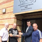 Russell Worthington hands over the keys to the Boxing Club.